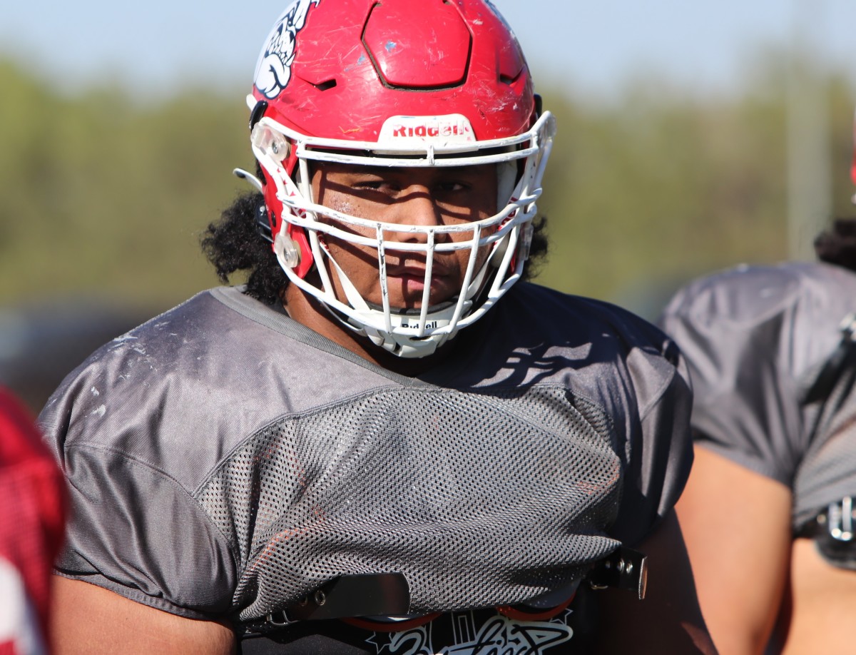 Pou Tatofi isn't always so serious, though football is always quite urgent for the senior at Oak Hills. 